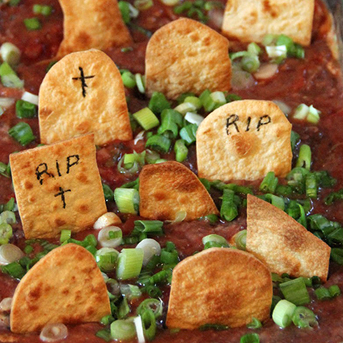 Taco Dip Graveyard • 13 Halloween Party Recipes • Little Gold Pixel via chickabug.com